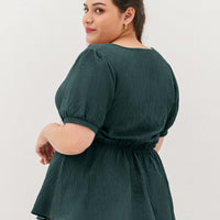Aria V-Neck Textured Peplum Blouse In Pine Green