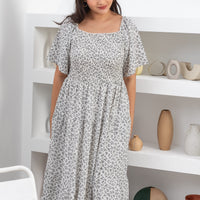 Flora Smocked Maxi Dress In White Floral