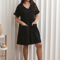 Olivia Buttoned Pocket Dress In Black