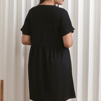 Olivia Buttoned Pocket Dress In Black